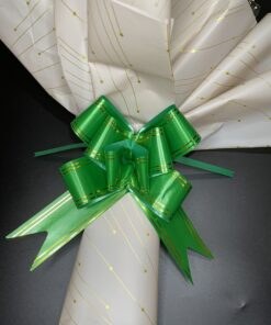 Ferrero Rocher and Chocolate Surprise, elegantly wrapped in Gold and topped with a Green Bow in the Bouquet